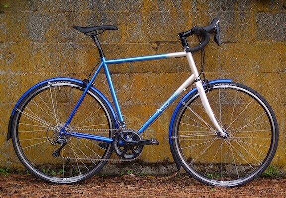 Blue and White fade road bike with fenders